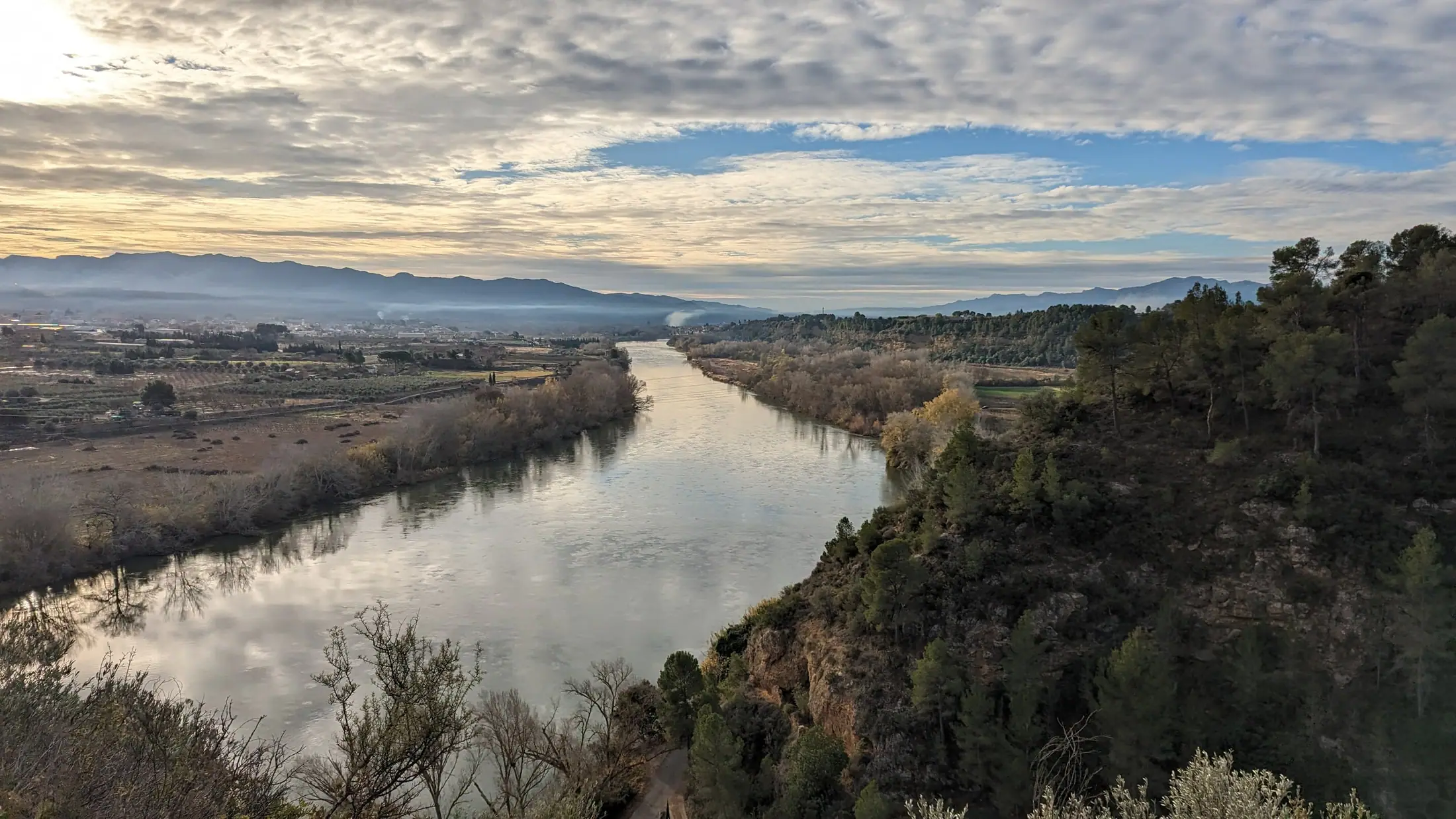 The Ebro winding through the valley below the hills